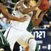 Michigan freshman Glenn Robinson III looks to pass the ball during the first half of an NIT Season Tip-Off game at Crisler Center on Tuesday. Melanie Maxwell I AnnArbor.com
